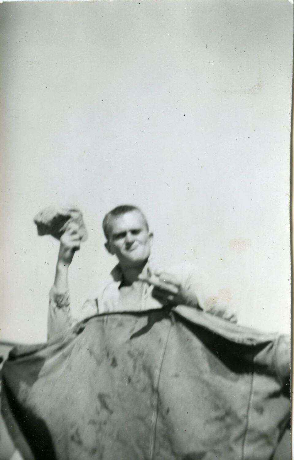 Marine of VMF-214 with Improvised Canvas Shelter, Pacific Theater, 1945