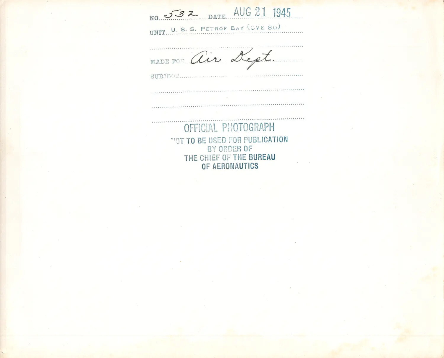 Verso Caption Card of Official U.S. Navy Photograph No. 532, U.S.S. Petrof Bay (CVE-80), August 21, 1945