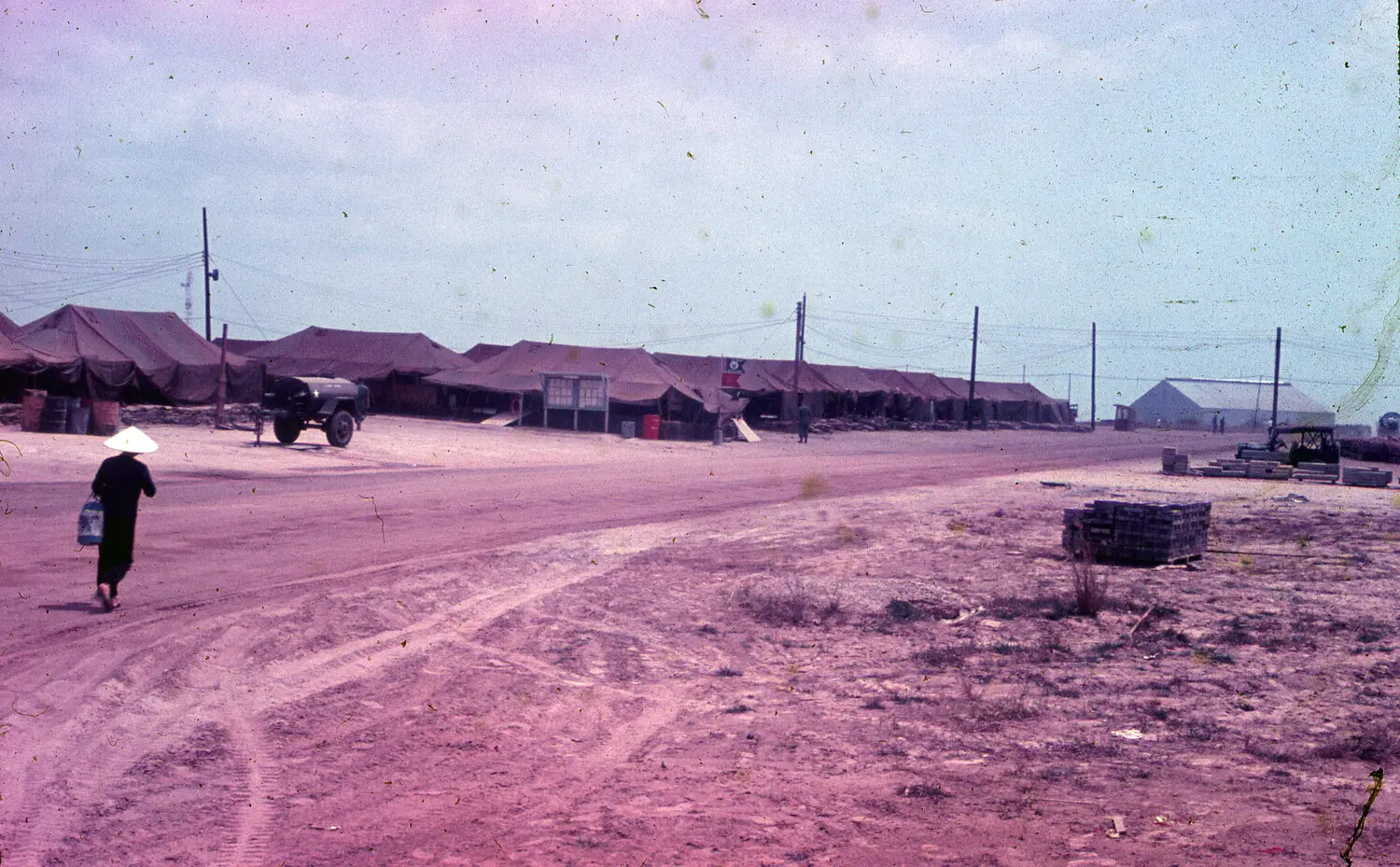 Tent Cantonment Area with Vietnamese Civilian, 3rd Tactical Fighter Wing Base, South Vietnam, 1965