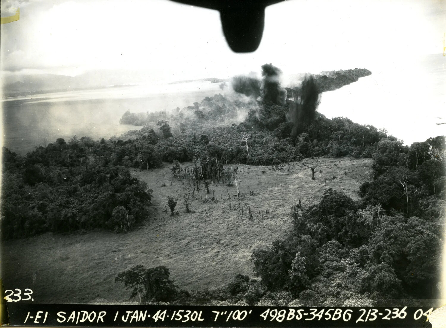 Strike Photograph — 345th Bombardment Group Attack Near Saidor, New Guinea, 1 January 1944