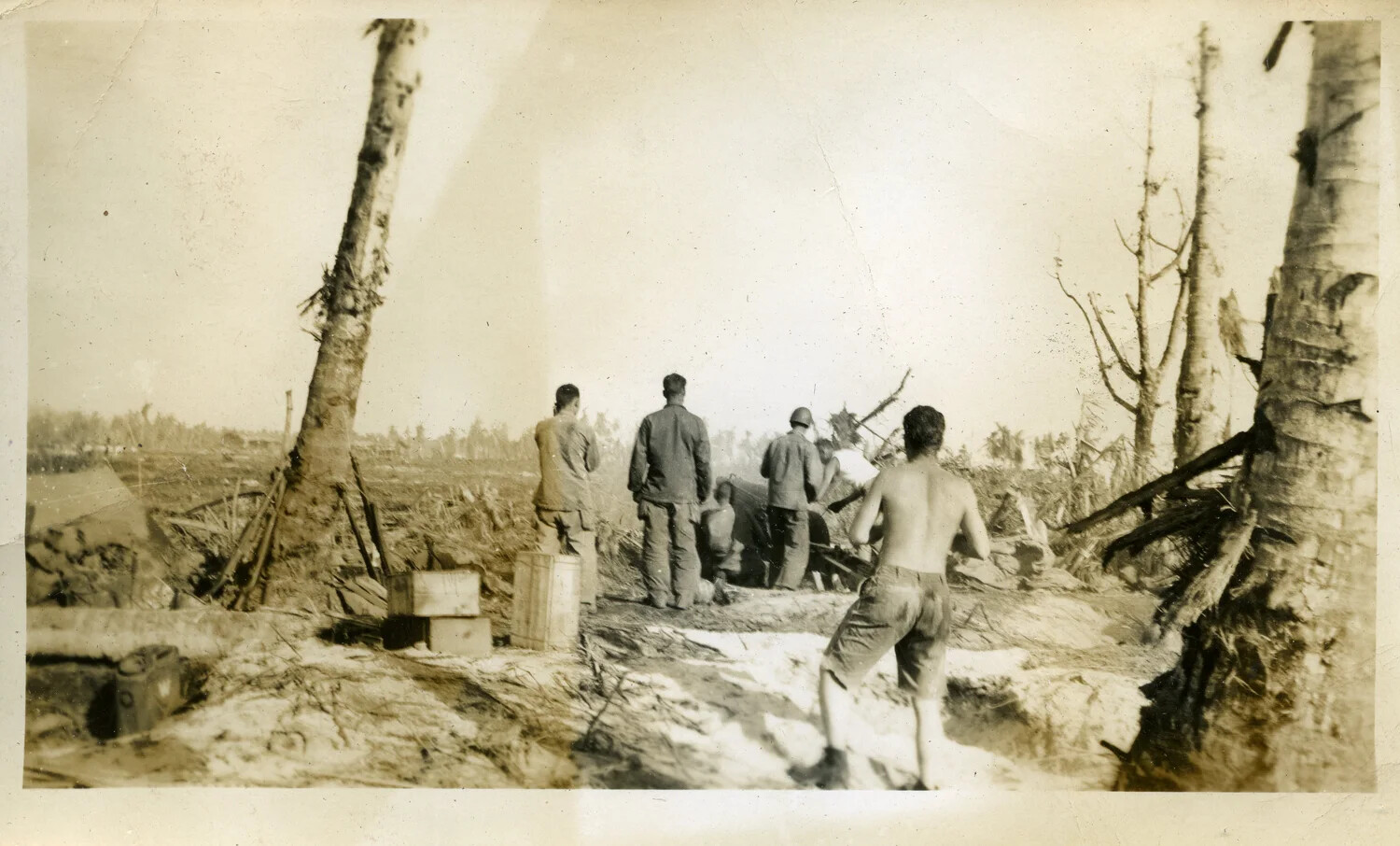 American Servicemen at Gun Position Amid Battle-Damaged Palm Grove, Kwajalein