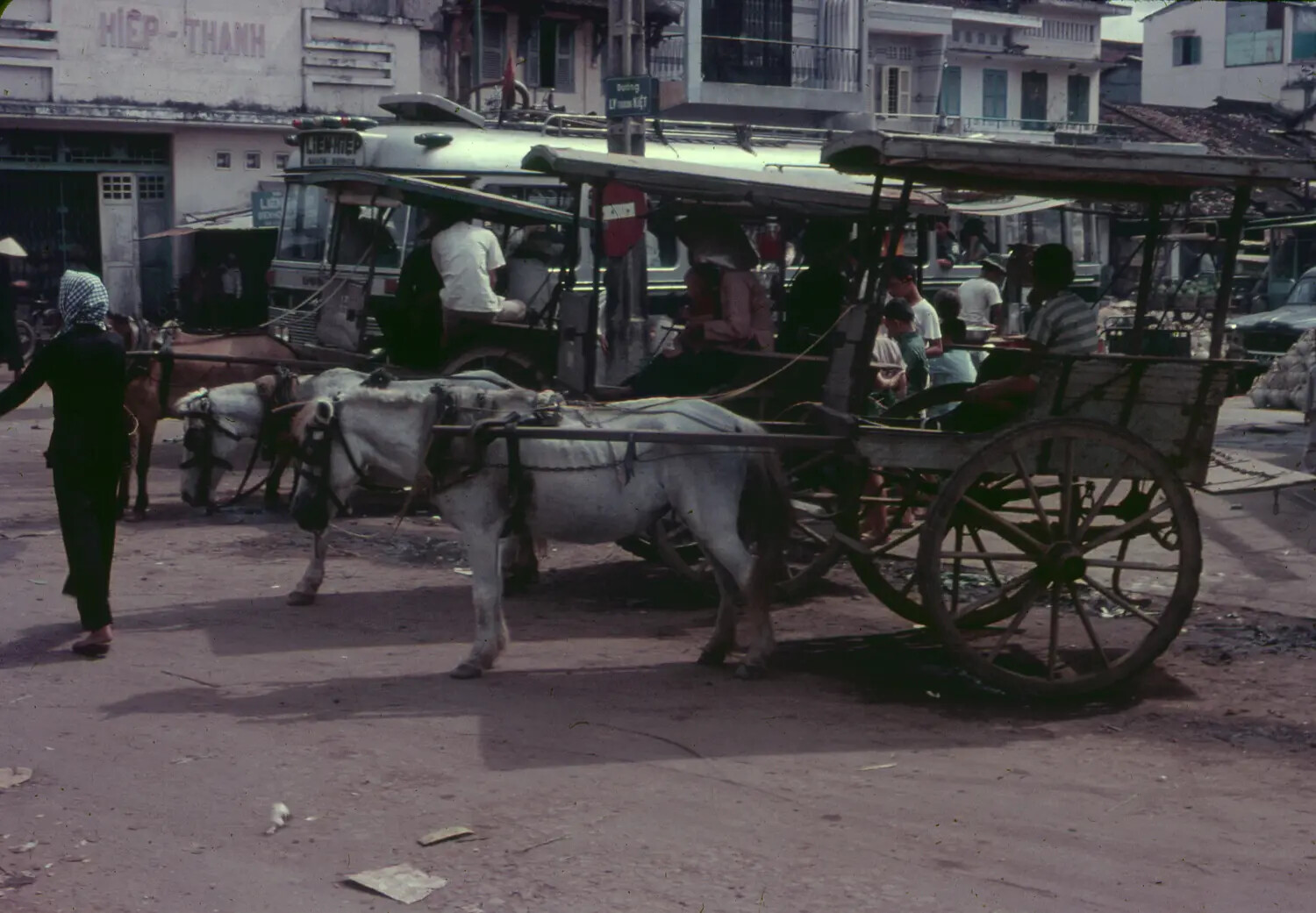 Street Scene with Horse Cart and Local Bus, South Vietnam, 1965 (3rd Tactical Fighter Wing Collection)
