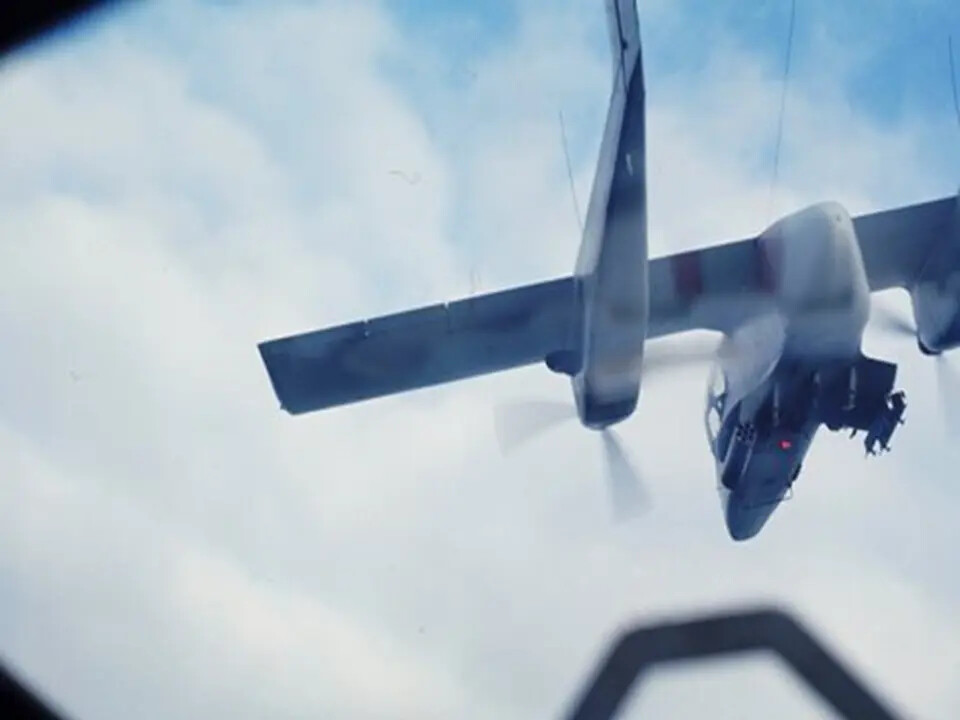 OV-10 Bronco in Banking Turn, Air-to-Air View from Companion Aircraft