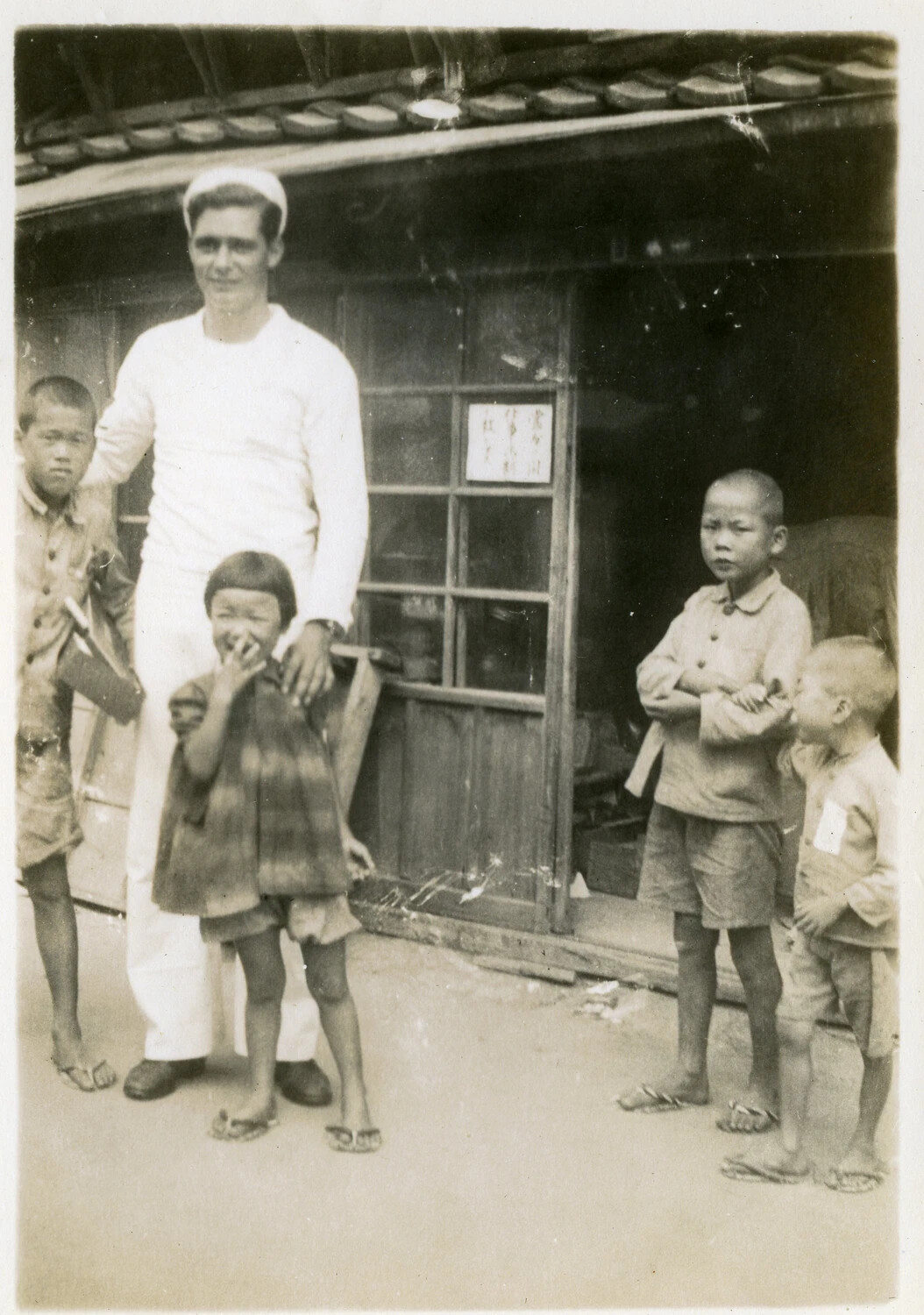 US Navy Sailor with Japanese Children, Occupied Japan, circa 1945-1946