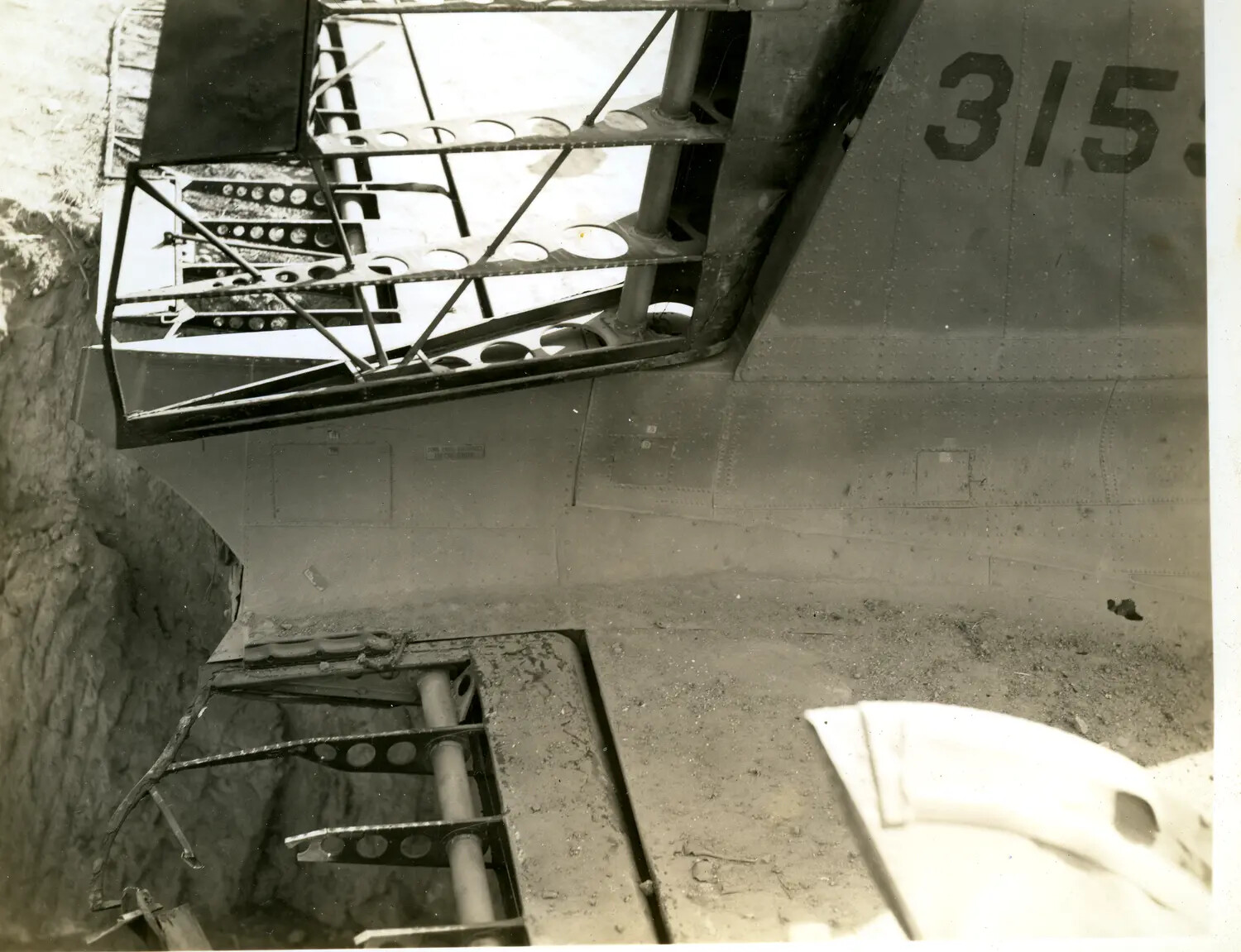 Damaged U.S. Aircraft Fuselage Section in Earthen Revetment, CBI Theater, WWII