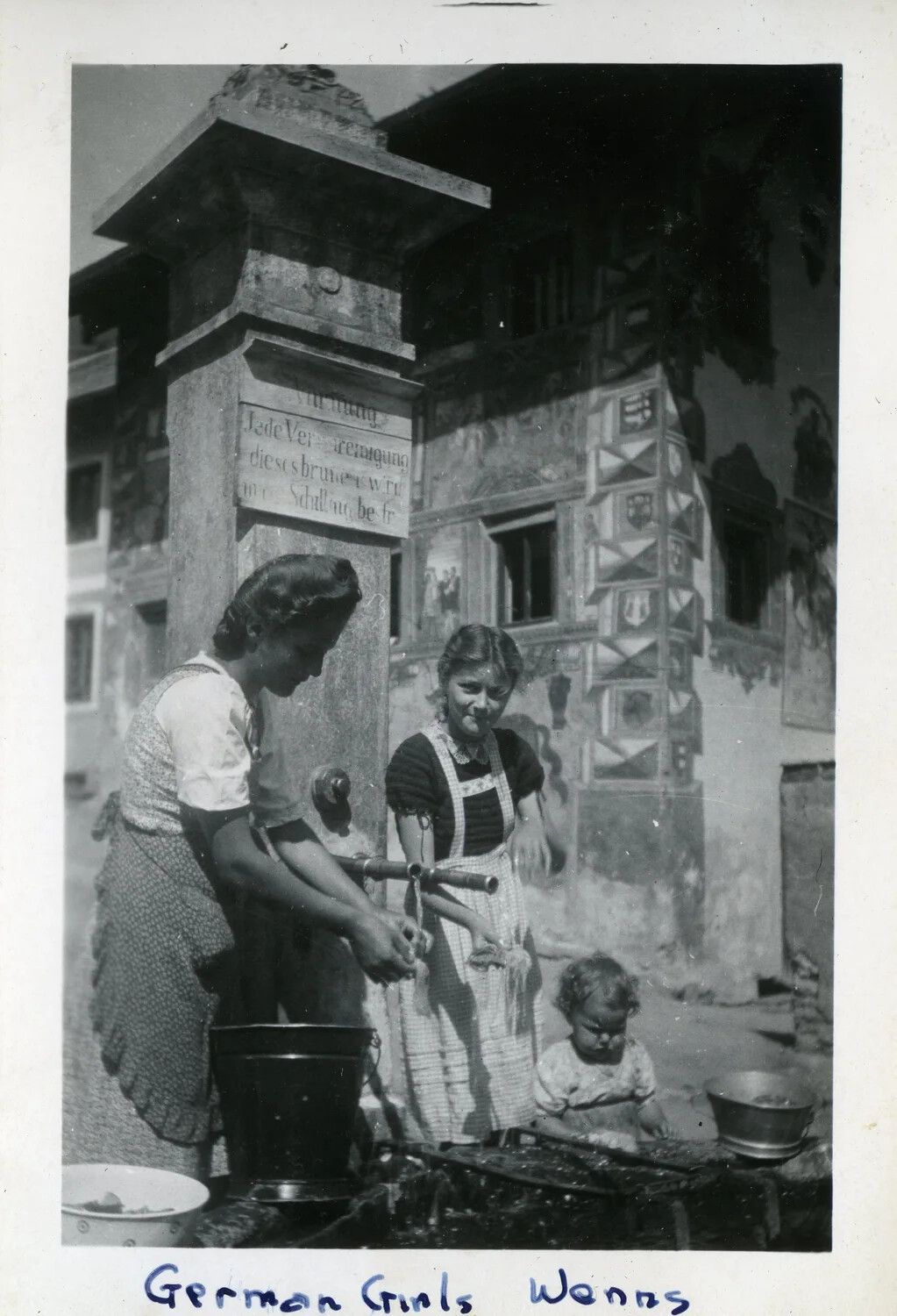 Local Women at a Village Fountain, Wenns, Tyrol — WWII Occupation-Era Photograph