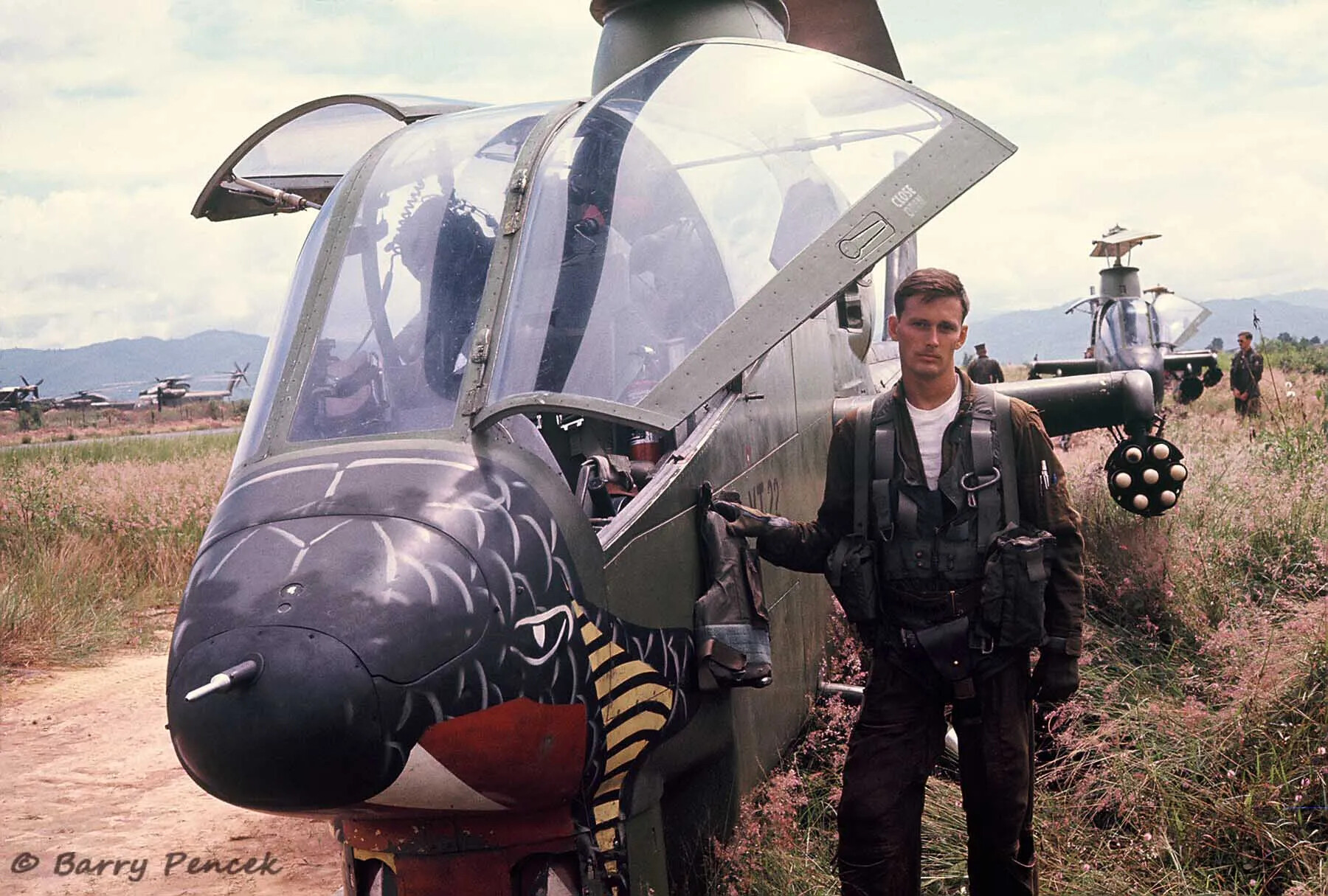 AH-1 Cobra Attack Helicopter with Nose Art and Pilot, Operation Tailwind-Related Photograph