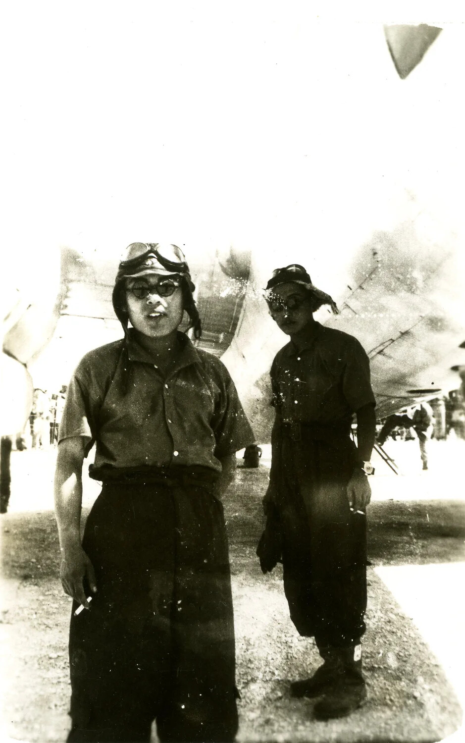 Two Aviators in Flight Gear Beside Aircraft, Possibly Related to the Ie Shima Envoy Flight, August 1945