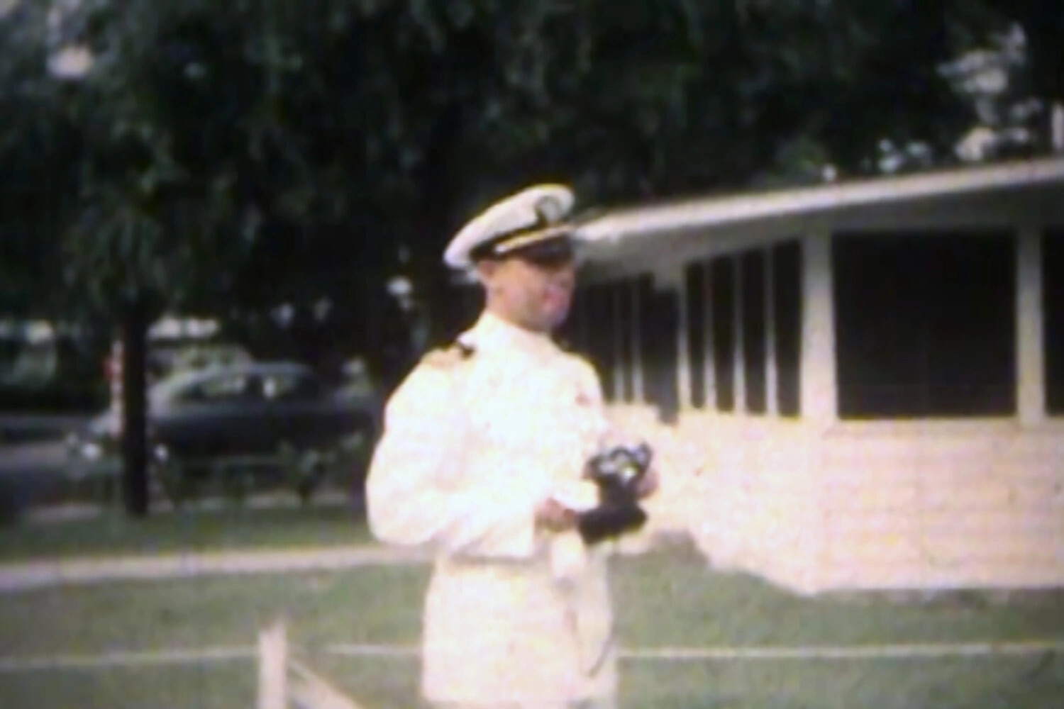 U.S. Navy Officer in Dress Whites, NAS Kaneohe Bay — Film Still, Bancroft/Joseph Smith Collection