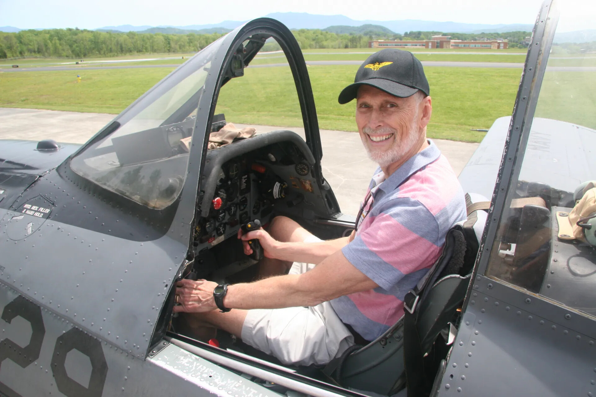 Reunion Attendee in Cockpit of Vintage Navy Trainer Aircraft, 2016 Operation Tailwind Event