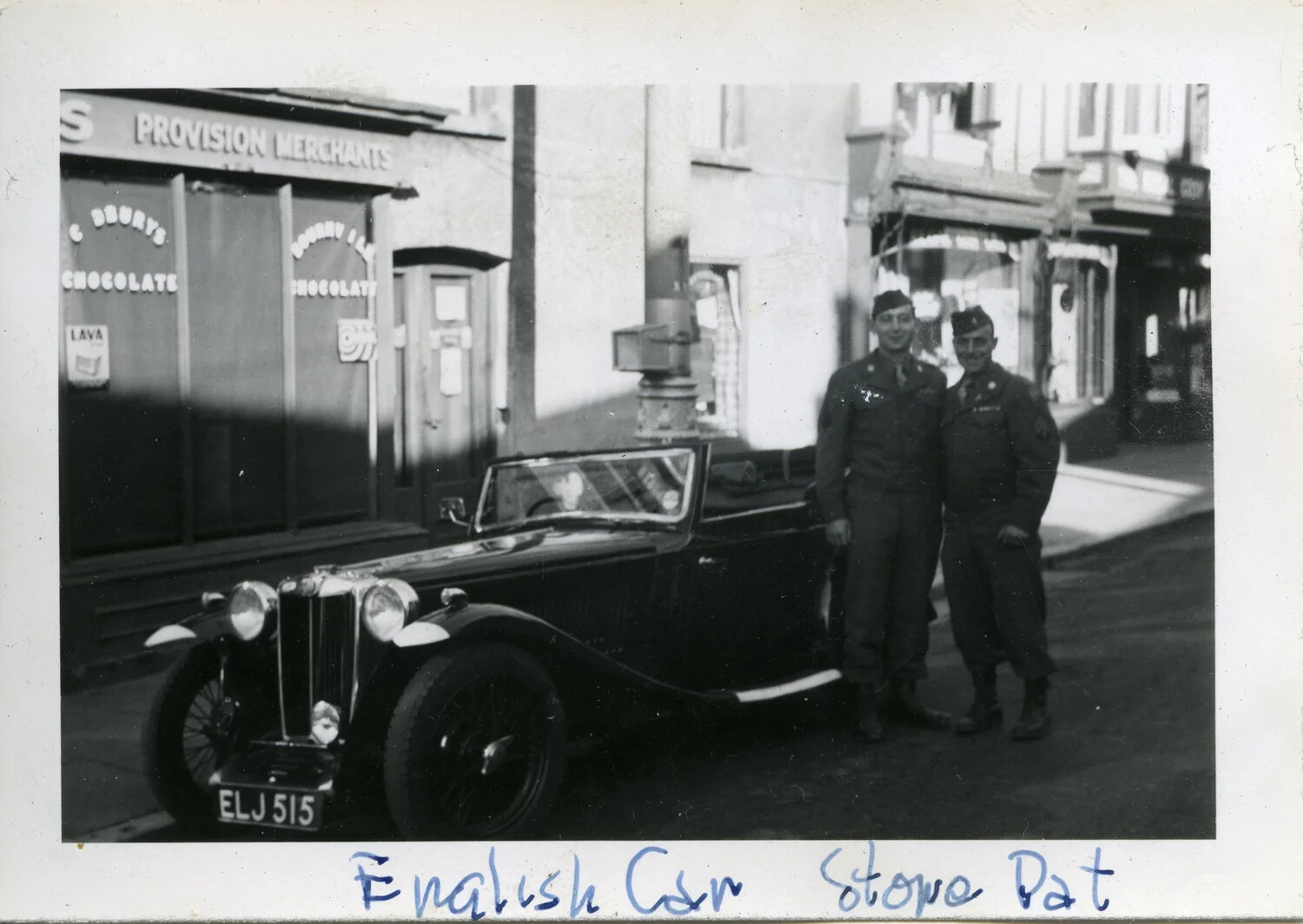 American Soldiers with British Roadster on an English High Street, WWII