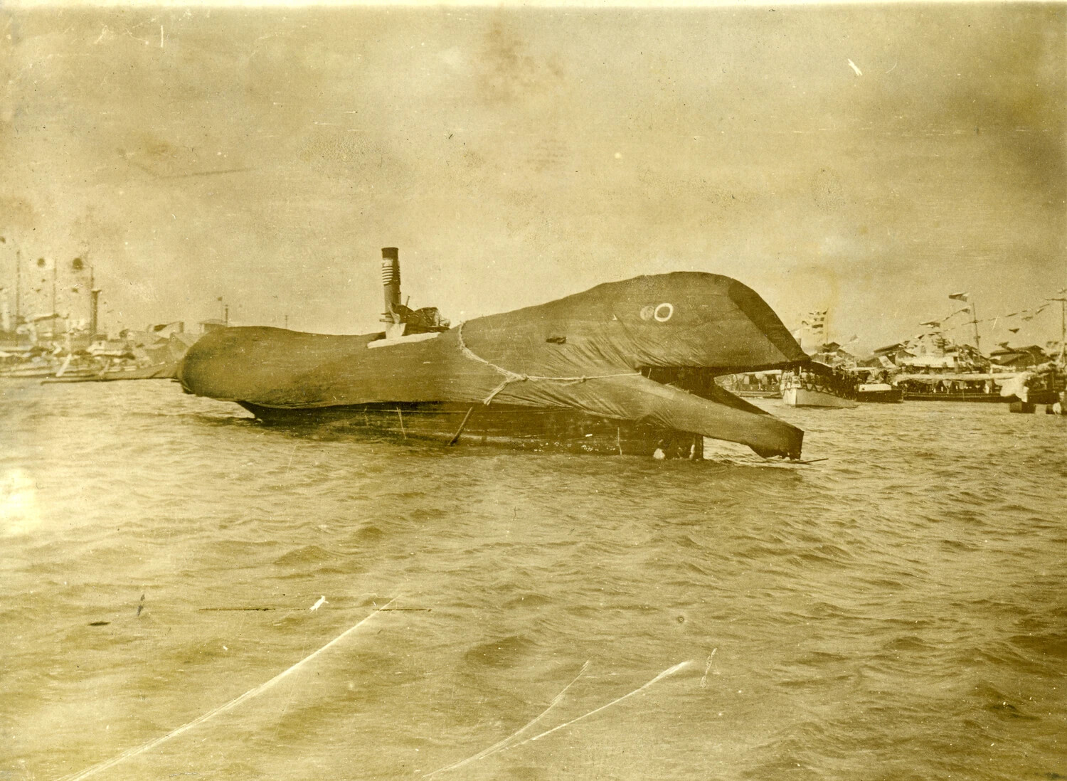 Small Vessel Capsized or Shrouded in Canvas, Philippine Harbor, Early 1900s (Carl Stone Album)