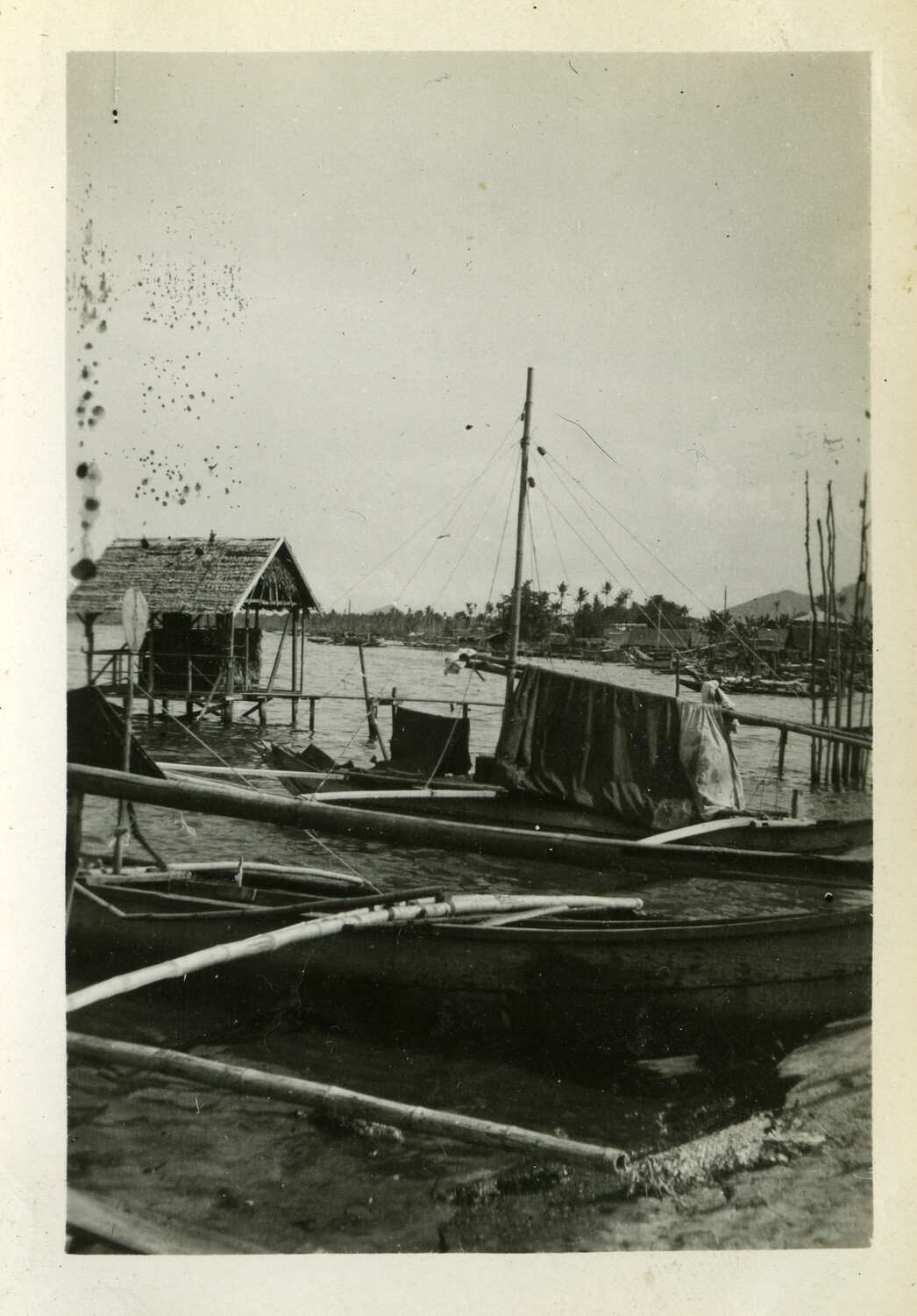 Outrigger Boats at a Coastal Village Harbor, Pacific Theater, World War II Era