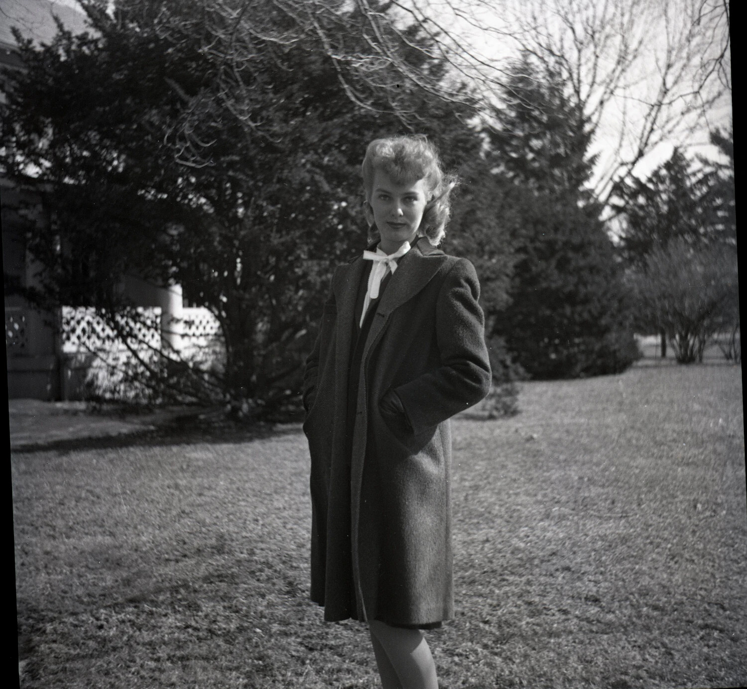 Portrait of a Young Woman in Wool Coat, Outdoor Setting