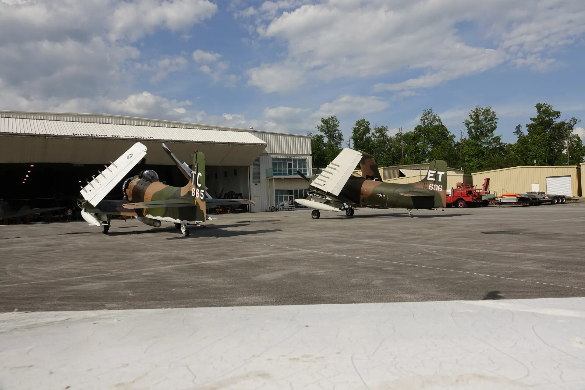 Two A-1 Skyraiders with Folded Wings Outside Museum of Aviation Hangar, Warner Robins, Georgia