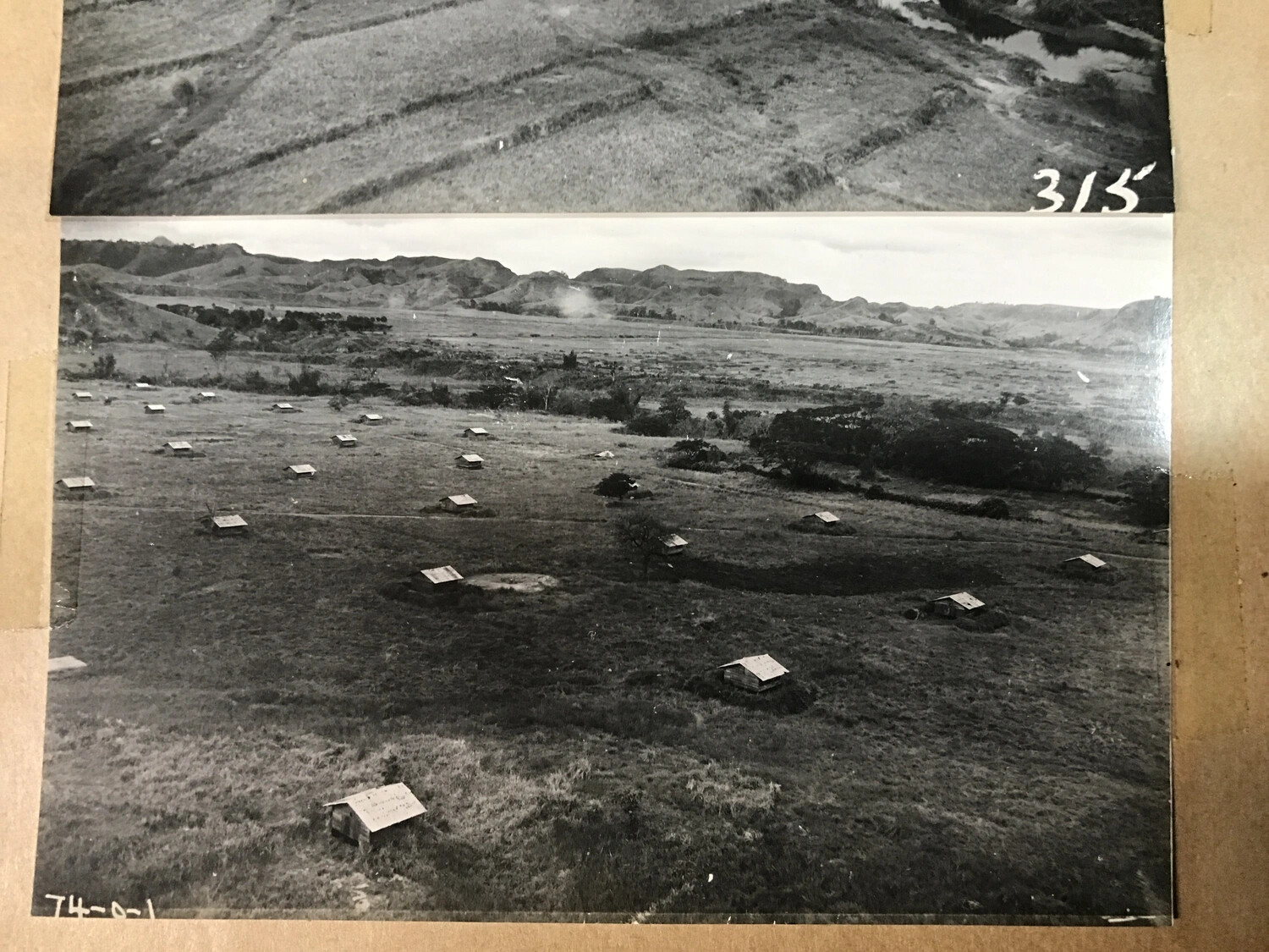 Album Page with Two Aerial/Elevated Views of a Dispersed Military Encampment or Airfield Support Area, Southwest Pacific Theater, WWII