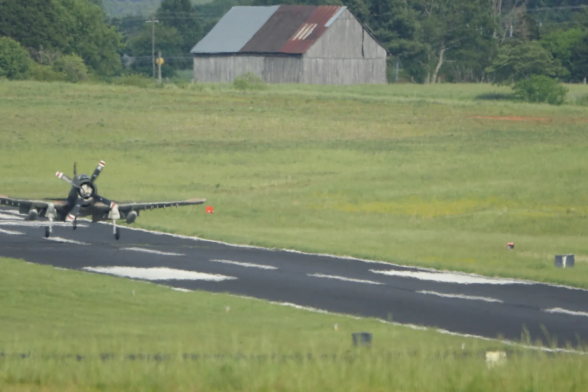 Douglas A-1 Skyraider Approaching Runway Threshold, Close Framing