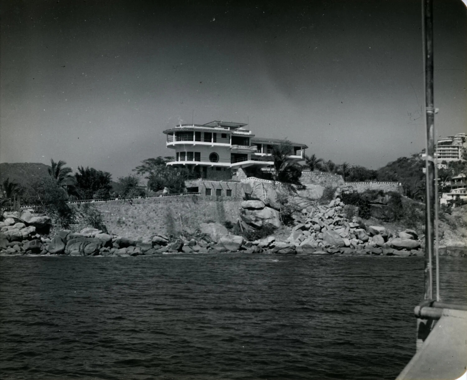Cliffside Villa on a Rocky Point, Likely Acapulco, Mexico