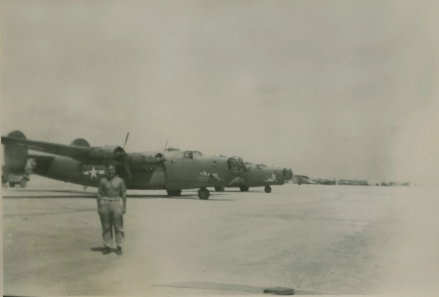 Line of Consolidated B-24 Liberator Heavy Bombers on Airfield Ramp, World War II