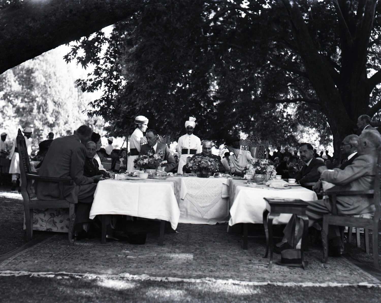 Garden Tea Reception with Kashmiri Attendants in Turbans, Kashmir, c. 1940s