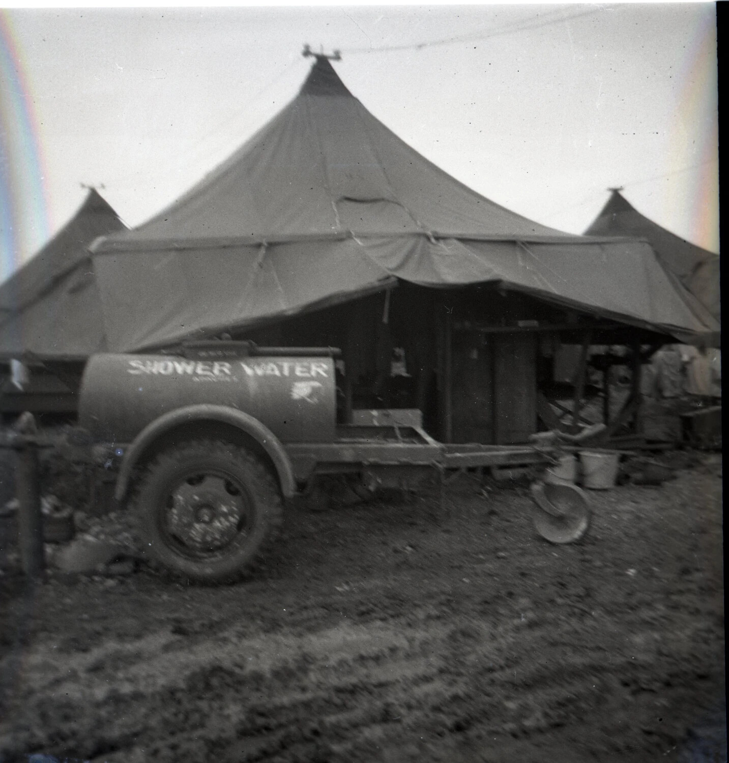 Field Shower-Water Trailer and Squad Tent, 345th Bombardment Group Encampment, Ie Shima, 1945