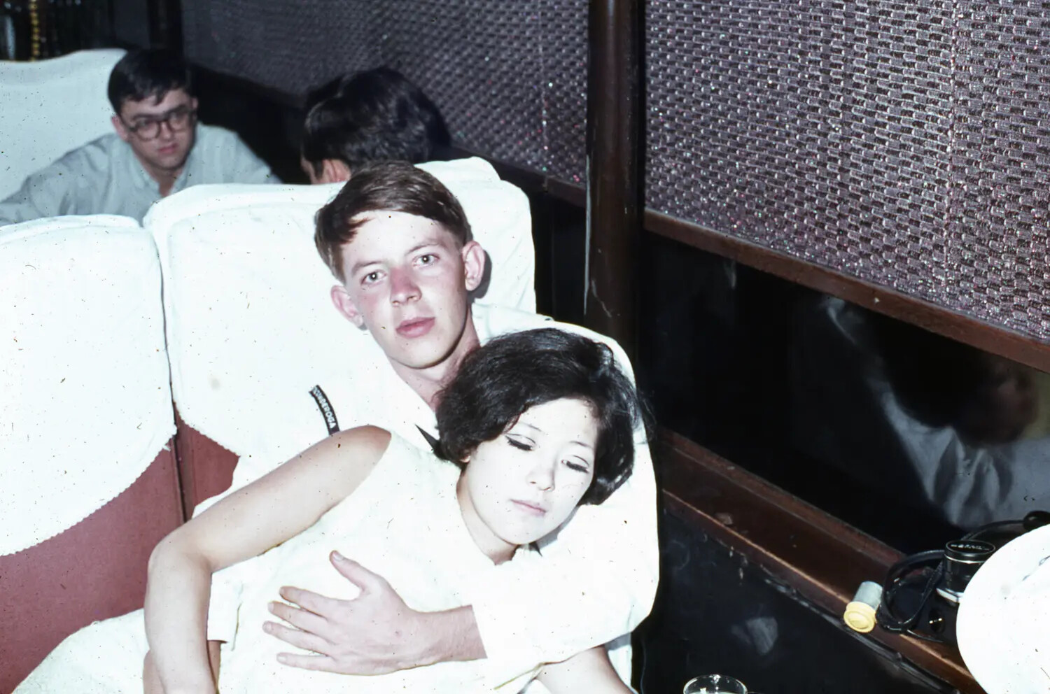 Young Sailor Embracing Companion in Nightclub Booth, Vietnam-Era Liberty Port