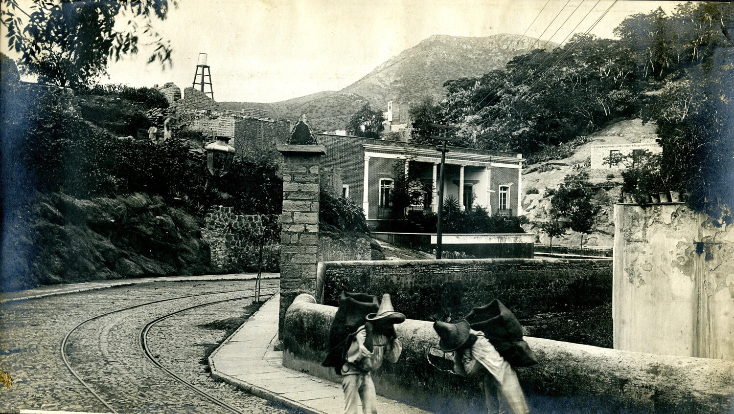 Mountain Street with Mine Headframe, Mexican Town, USS Columbia Album, c. 1898-1908