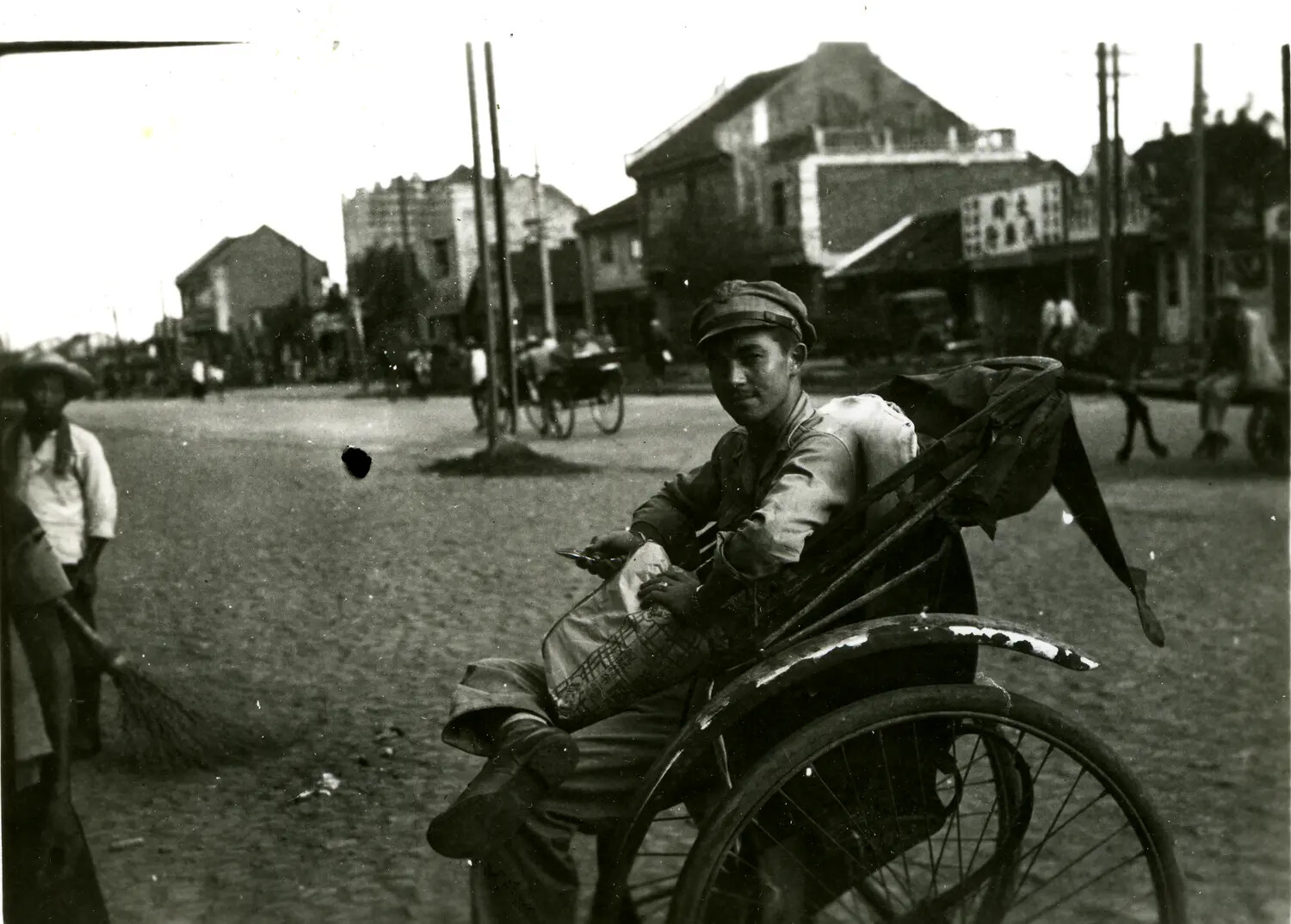 Street Scene with Rickshaw Passenger, China, WWII China-Burma Theater