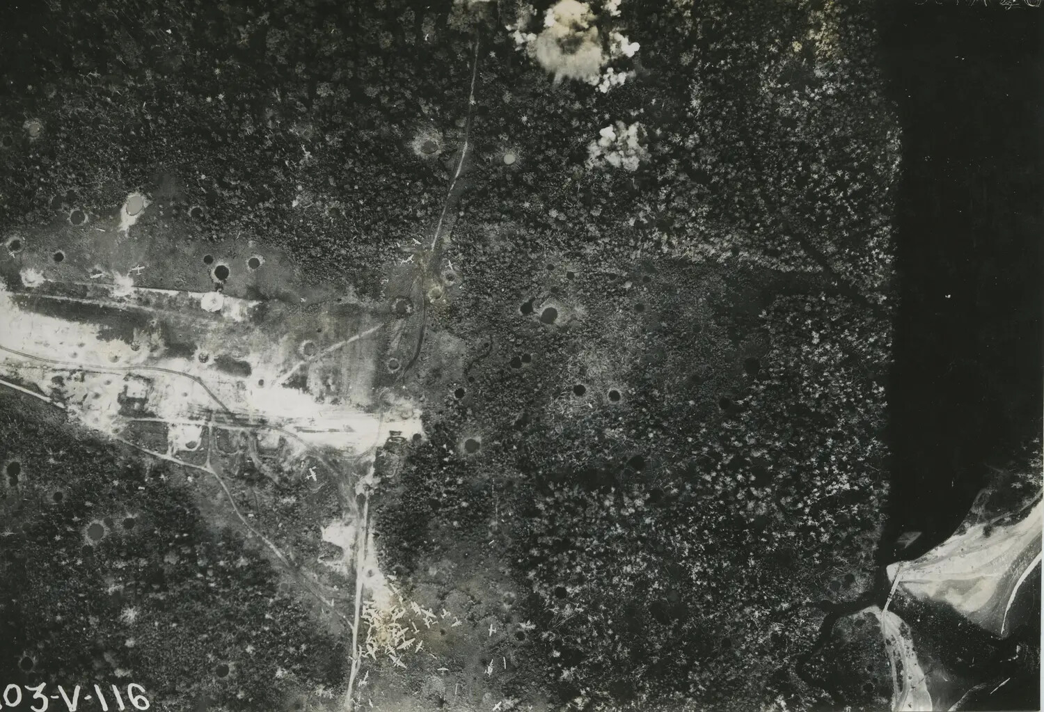 Aerial Strike Photograph of Bombed Airfield, 312th Bombardment Group (WWII, Pacific Theater)