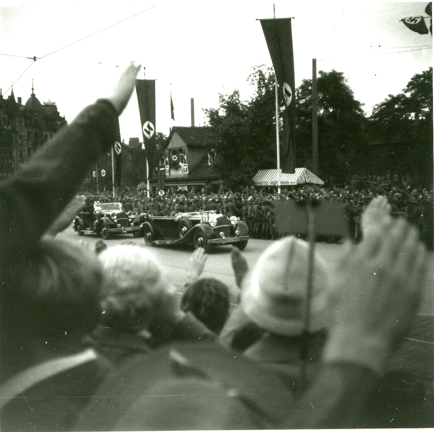 Nazi Motorcade Passing Crowd Near 'Photo Hoffmann' Stand, Berlin, 1930s