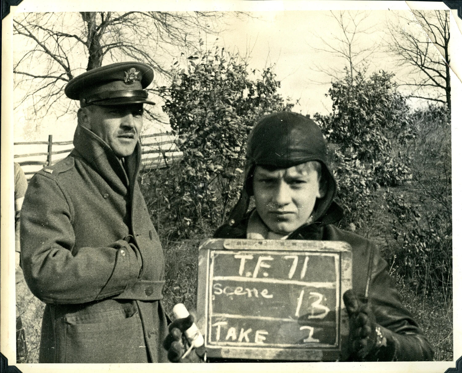 U.S. Army Signal Corps Film Production Still: Officer and Clapperboard Operator, "T.F. 71, Scene 13, Take 2"