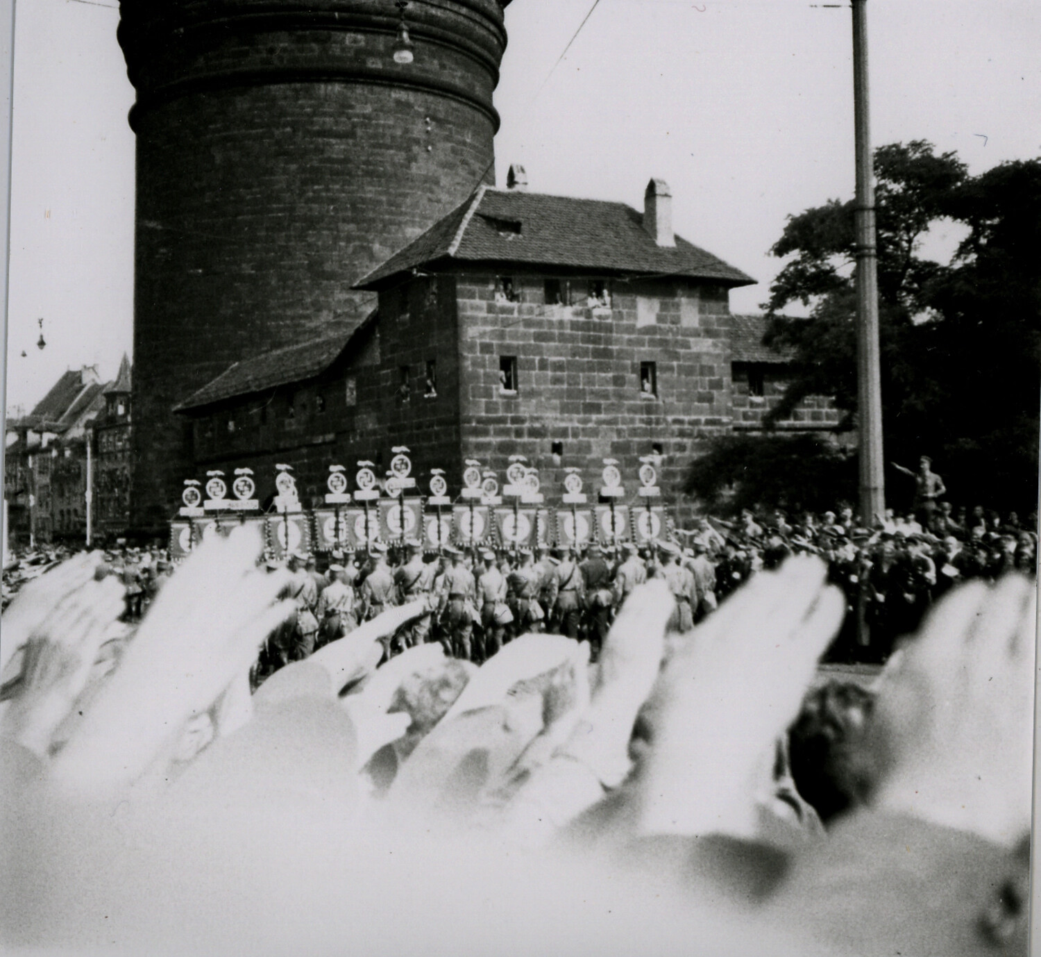 Nazi Party Rally Procession Past Medieval Tower, Nuremberg, Germany, c. 1933-1938