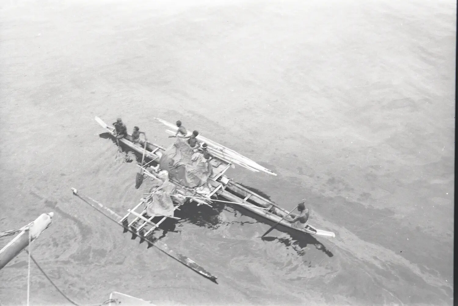 Outrigger Canoe Alongside USS Petrof Bay