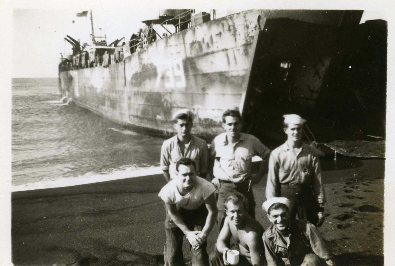 Navy Crew Posing Before Beached Landing Ship, Occupied Japan, circa 1945-1946