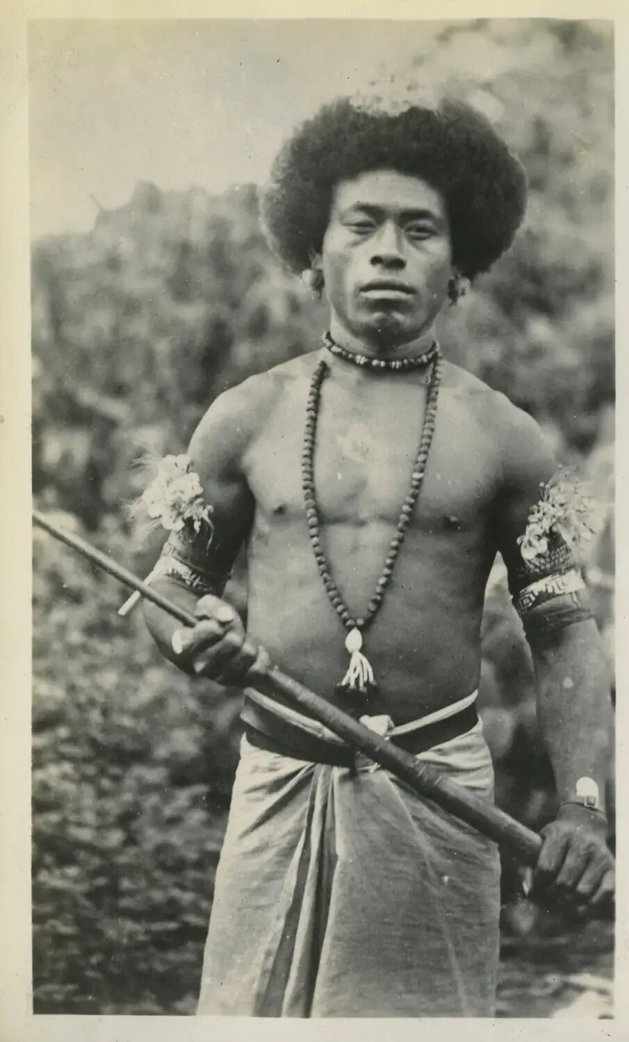 Portrait of an Indigenous New Guinean Man in Traditional Dress, WWII Pacific Theater