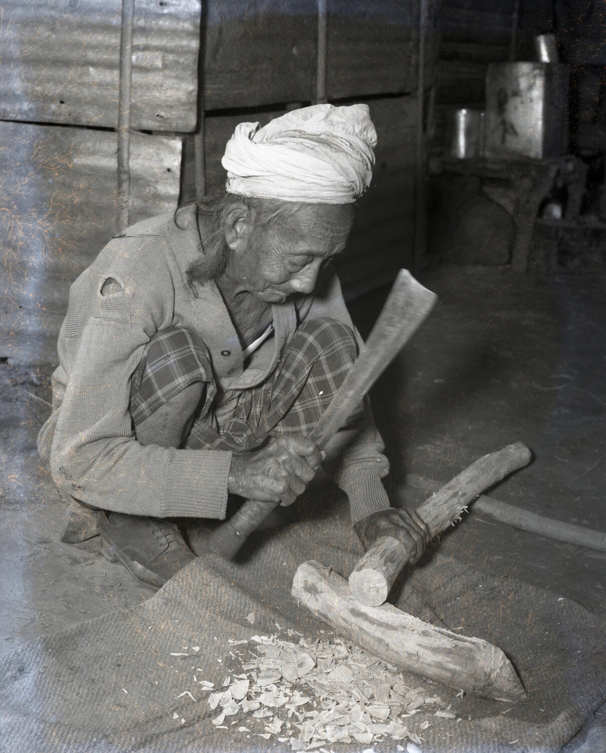 Local Craftsman Carving Wood with Adze, CBI Theater, WWII