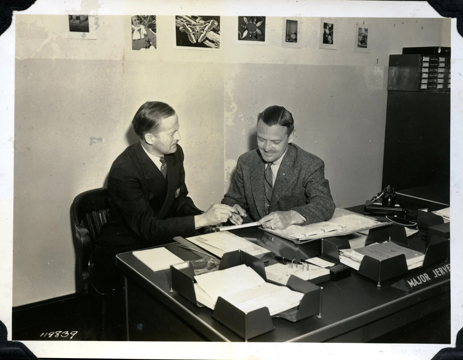 Office Portrait of Two Men at the Desk of "Major Jervey," U.S. Army Signal Corps Photo Album