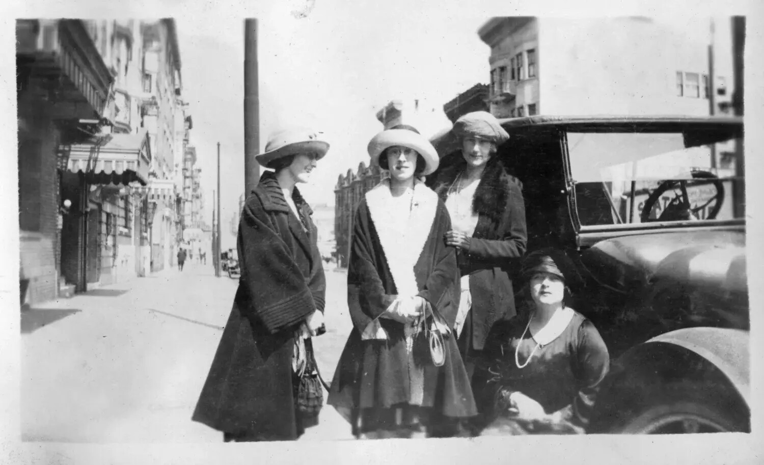 Four Women on a City Street Beside a Touring Automobile, c. Early 1920s