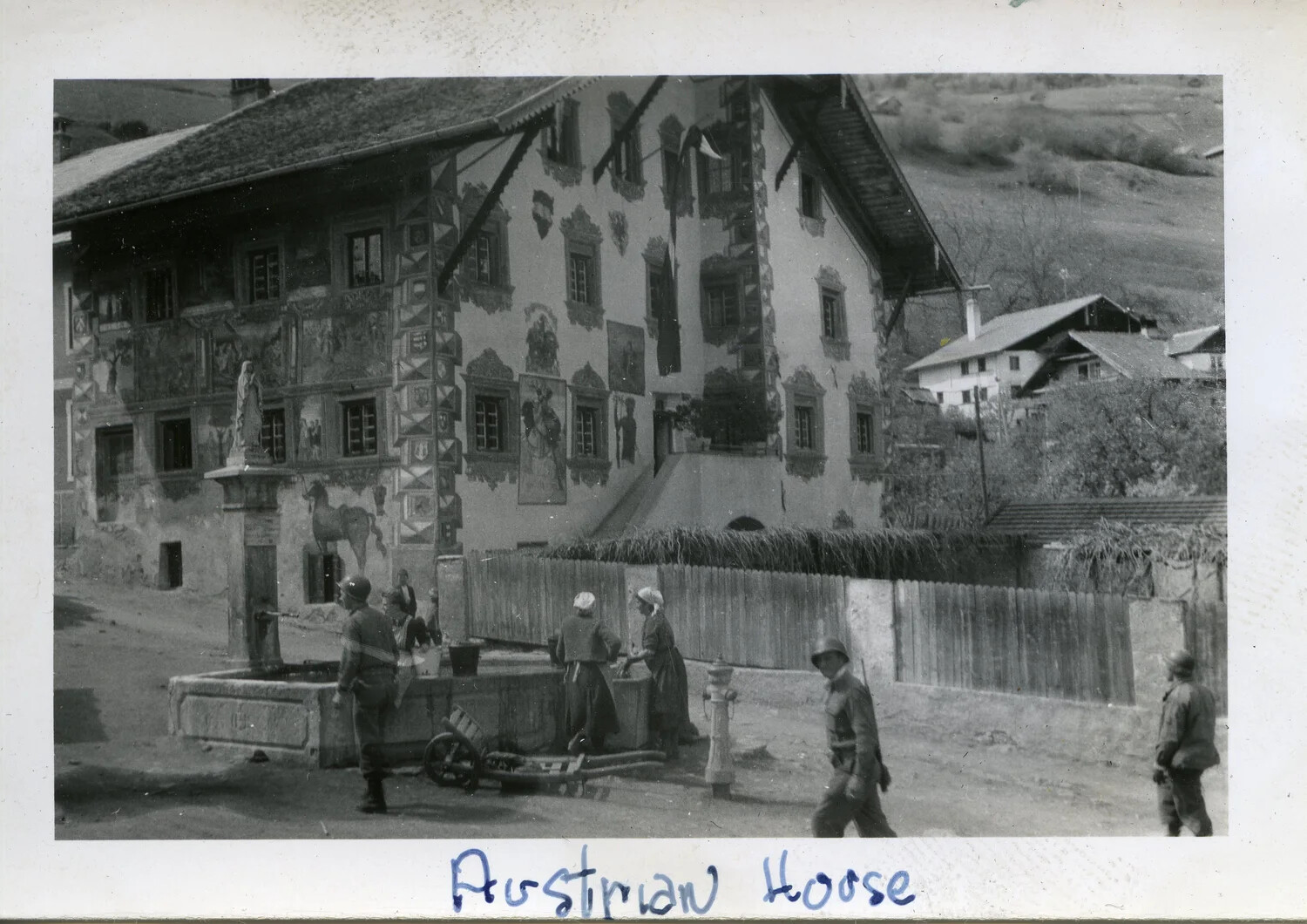 American GIs at Village Fountain Beside Painted Austrian House, 44th Infantry Division, WWII