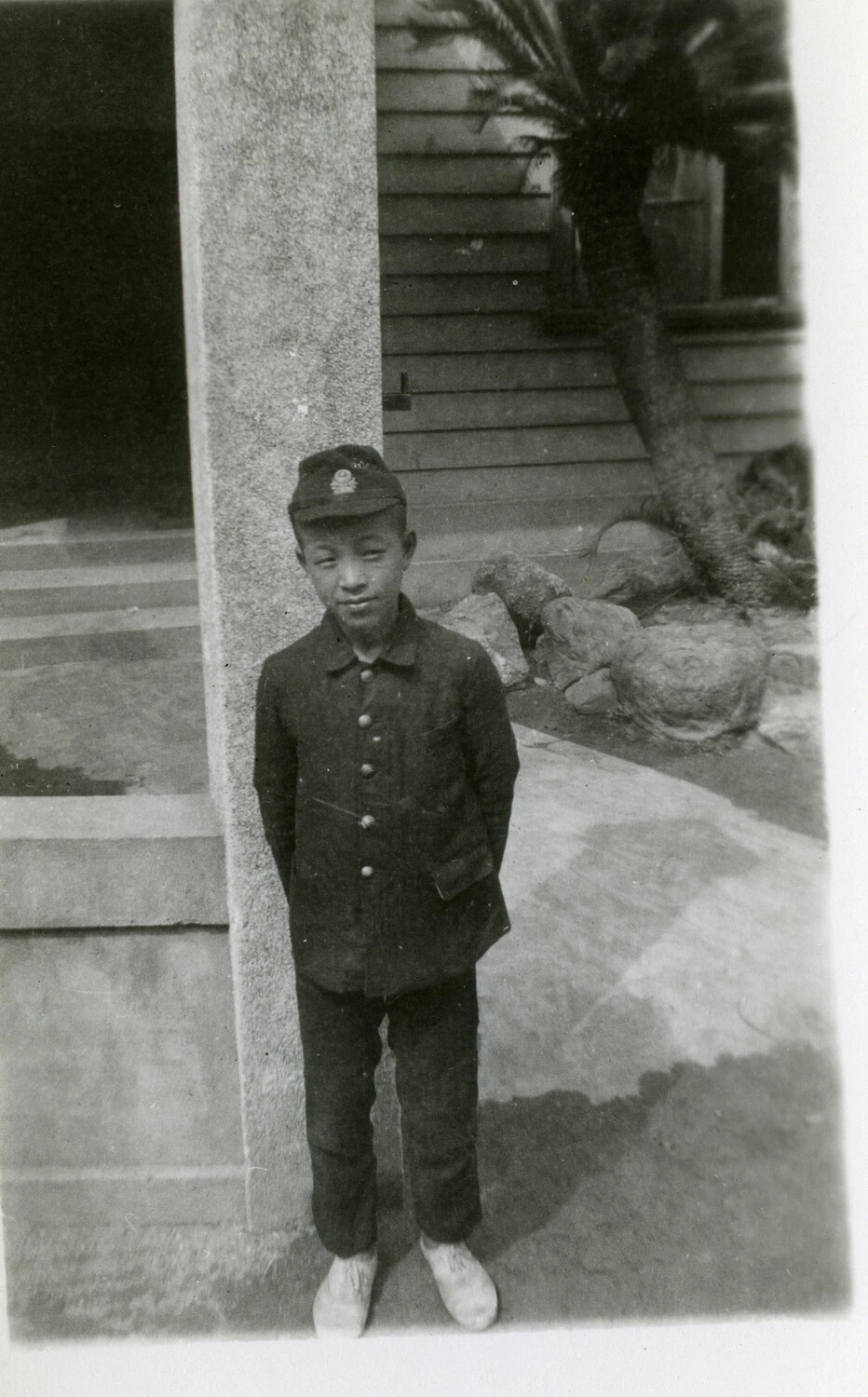 Portrait of a Japanese Schoolboy in Garden Setting, Occupied Japan