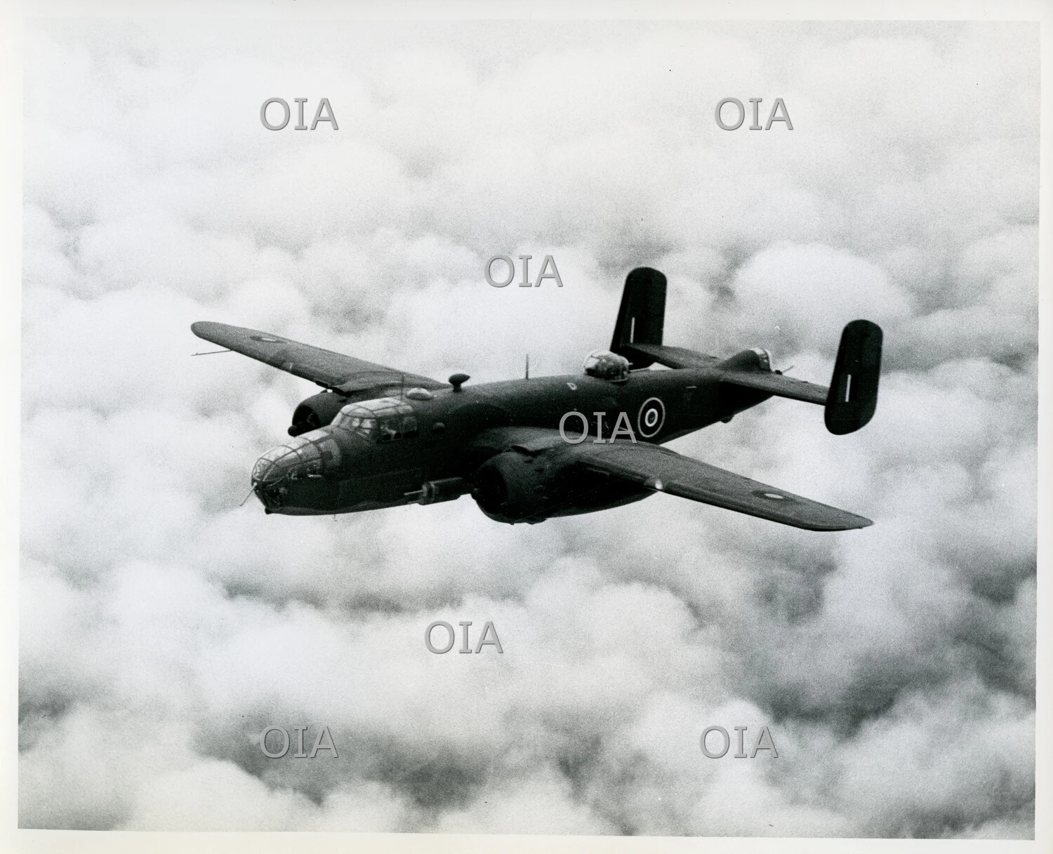 North American B-25 Mitchell Medium Bomber in Flight Above Clouds
