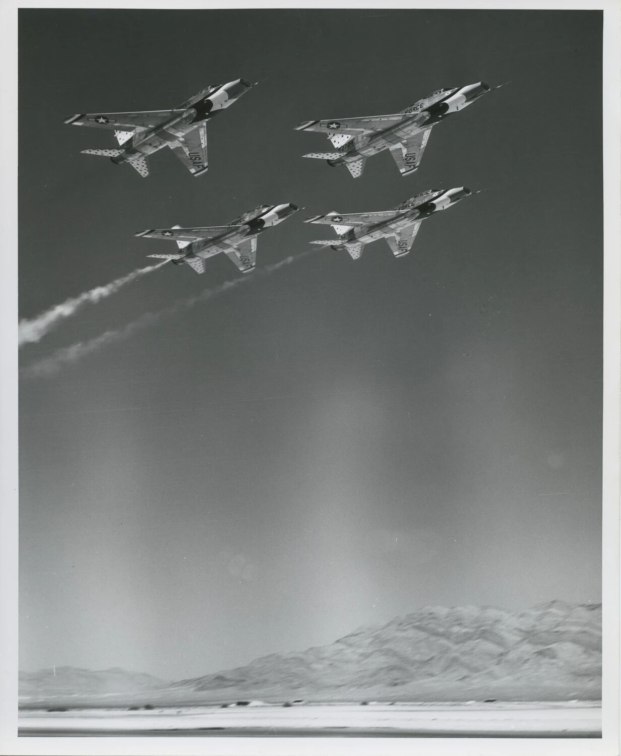Thunderbirds F-100 Super Sabres in Banked Box Formation Over Desert Valley