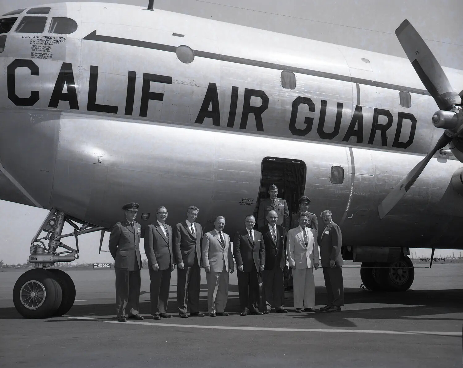 Civilian Dignitaries and Air Force Officers Pose Before a California Air National Guard Boeing C-97 Stratofreighter, April 1960