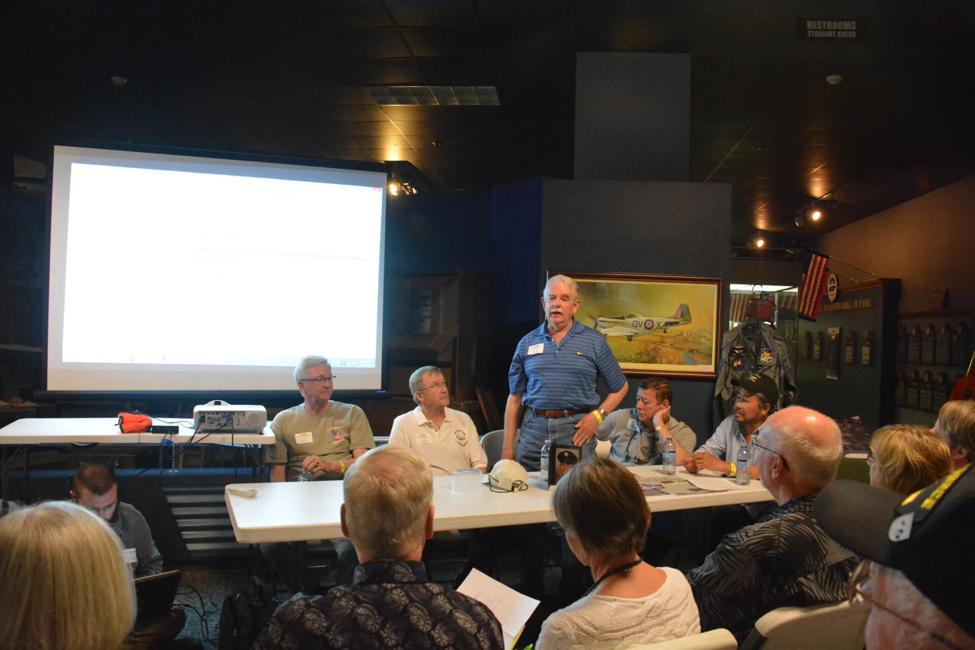Veterans' Reunion Meeting, Aviation Museum — Panel Discussion with Text Slide