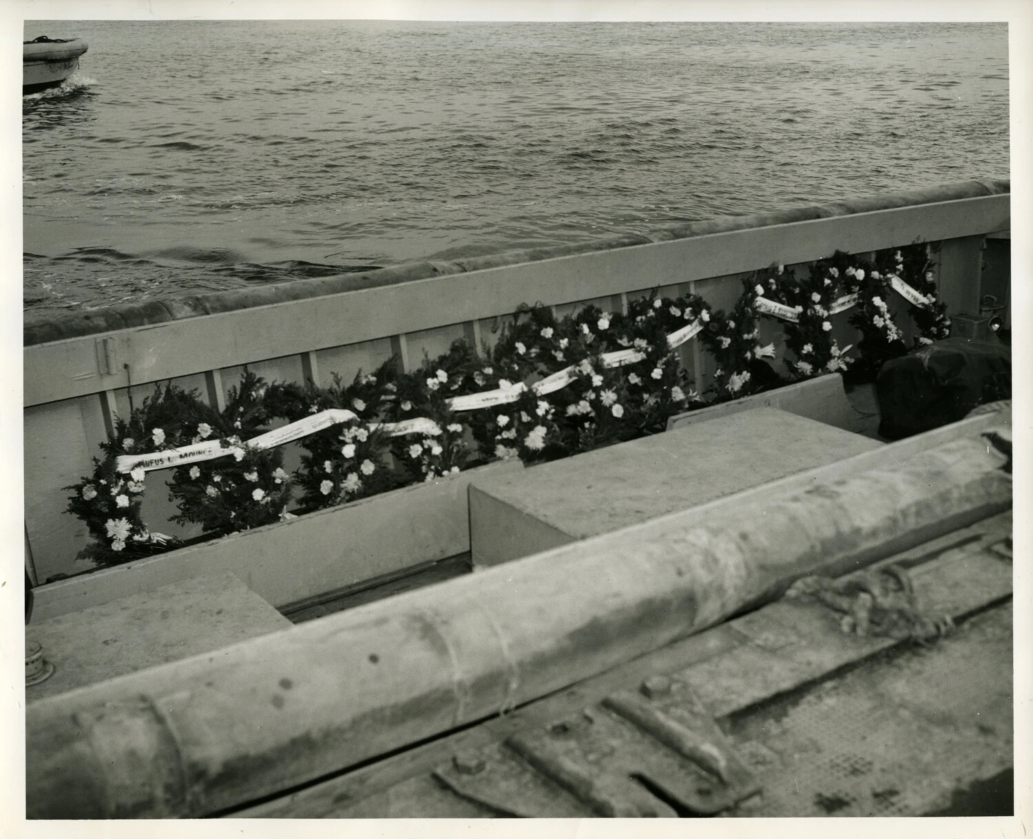 Memorial Wreaths Displayed Along Ship's Rail, Korean War Era