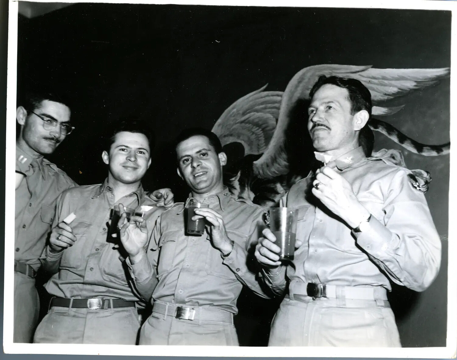 Four U.S. Army Officers Toasting at an Officers' Club, China-Burma-India Theater, WWII