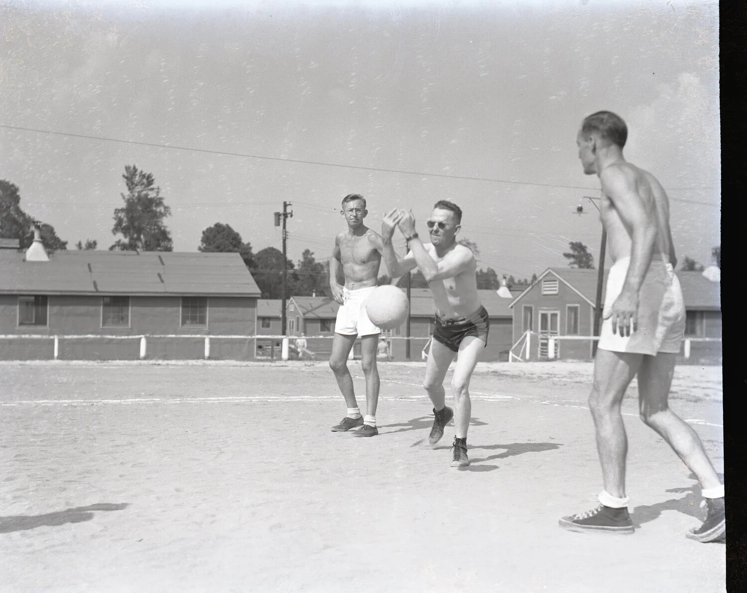 U.S. Officers Playing Volleyball at a Military Base - WWII China-Burma-India Theater Collection (Kotec Collection)