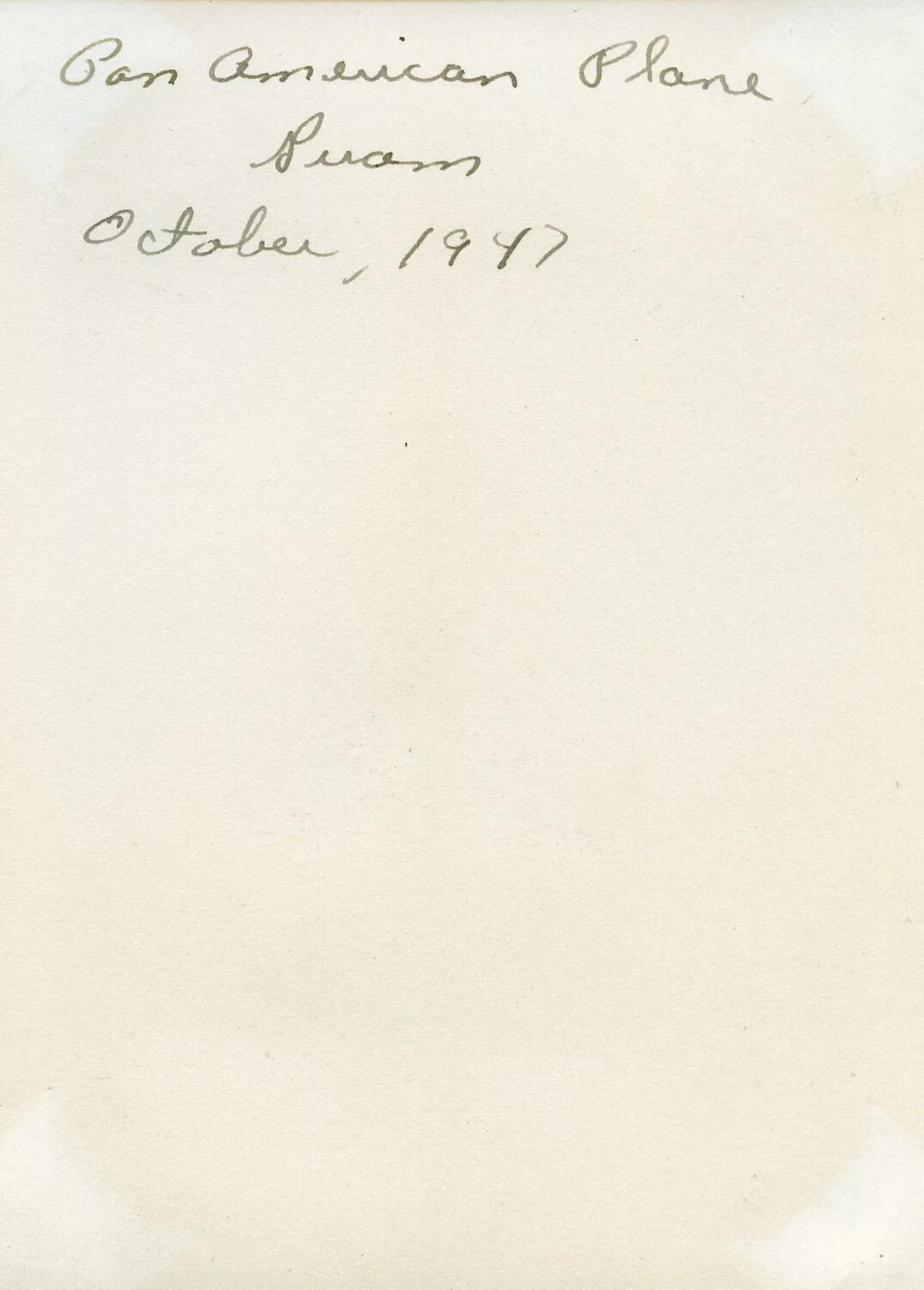 Handwritten Album Caption Page: 'Pan American Plane, Guam, October, 1947'