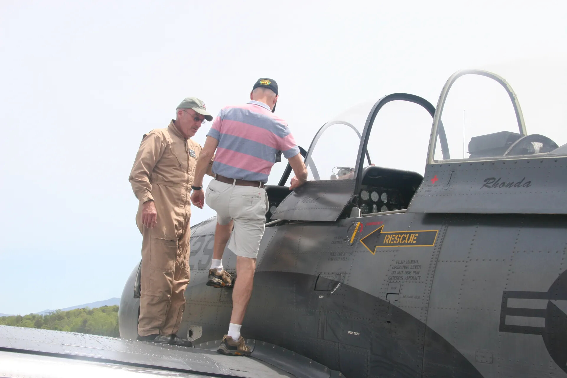 Veterans Examining Cockpit of Restored A-1 Skyraider 'Rhonda,' Operation Tailwind Reunion, 2016