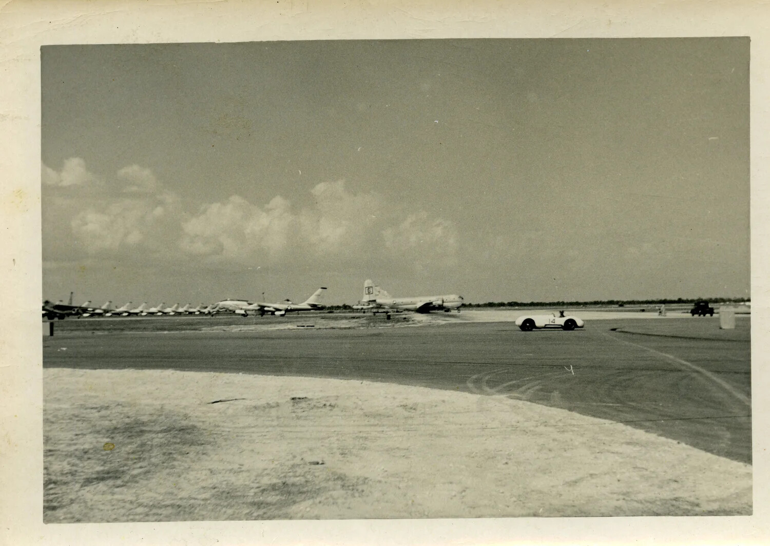 Flight Line of Boeing B-47 Stratojet Bombers with Sports Racing Car on Ramp, USAF Strategic Air Command Base, Mid-1950s